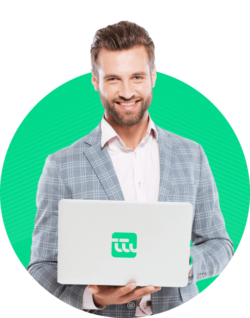 Smiling developer holding a laptop