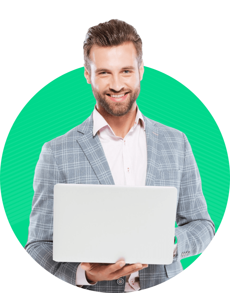 Smiling developer holding a laptop